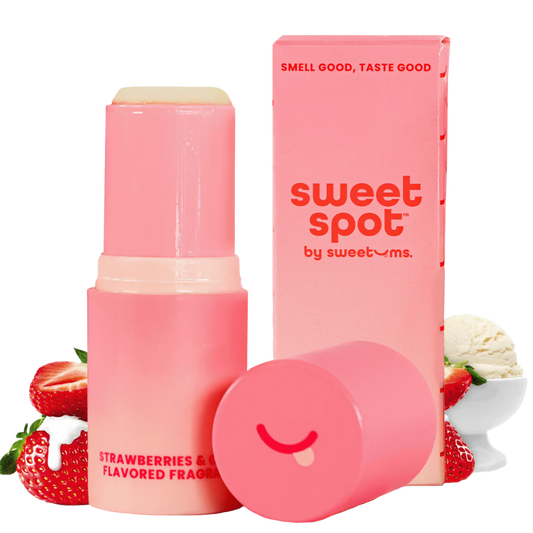 strawberries and cream sweet spot flavored fragrance with packaging and strawberries on a white background