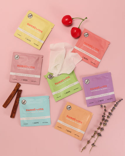 a variety of flavors of sweetums flavored intimate wipes