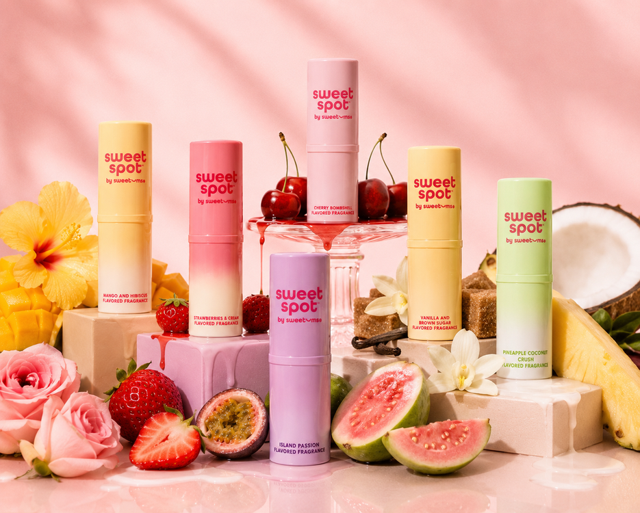 sweet spot flavored fragrances on a pink background with fruit