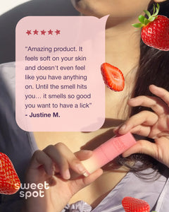 Person holding a strawberries and cream sweet spot flavored fragrance featuring a review quote.
