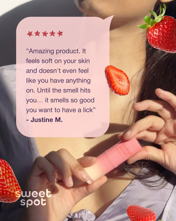 Person holding a strawberries and cream sweet spot flavored fragrance featuring a review quote.