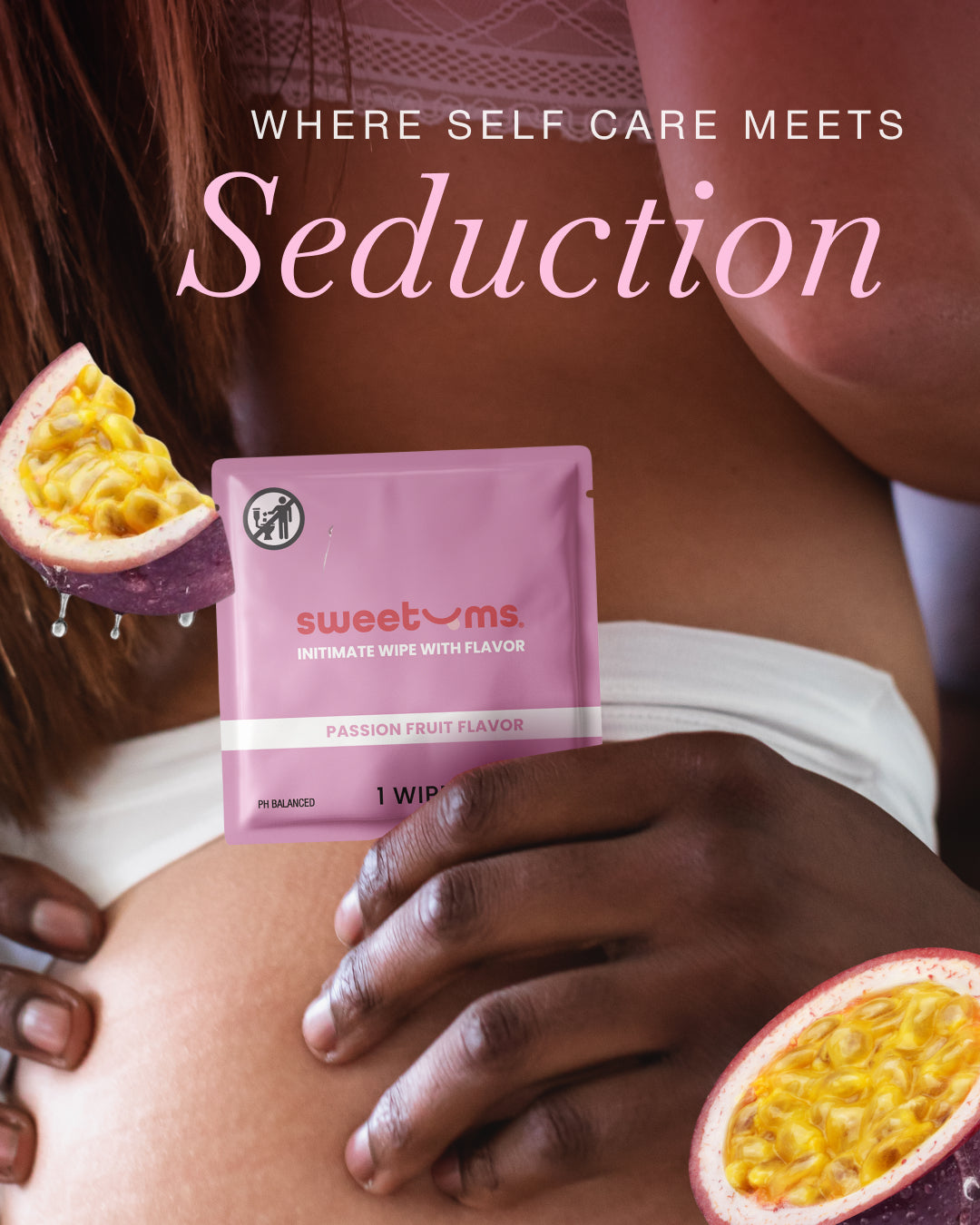 Sweetums intimate wipes packaging with passion fruit flavor being held by a man's hand while holding a woman