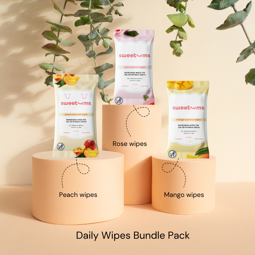 Daily Wipes Bundle Pack with  peach, rose, and mango scented feminine wipes.