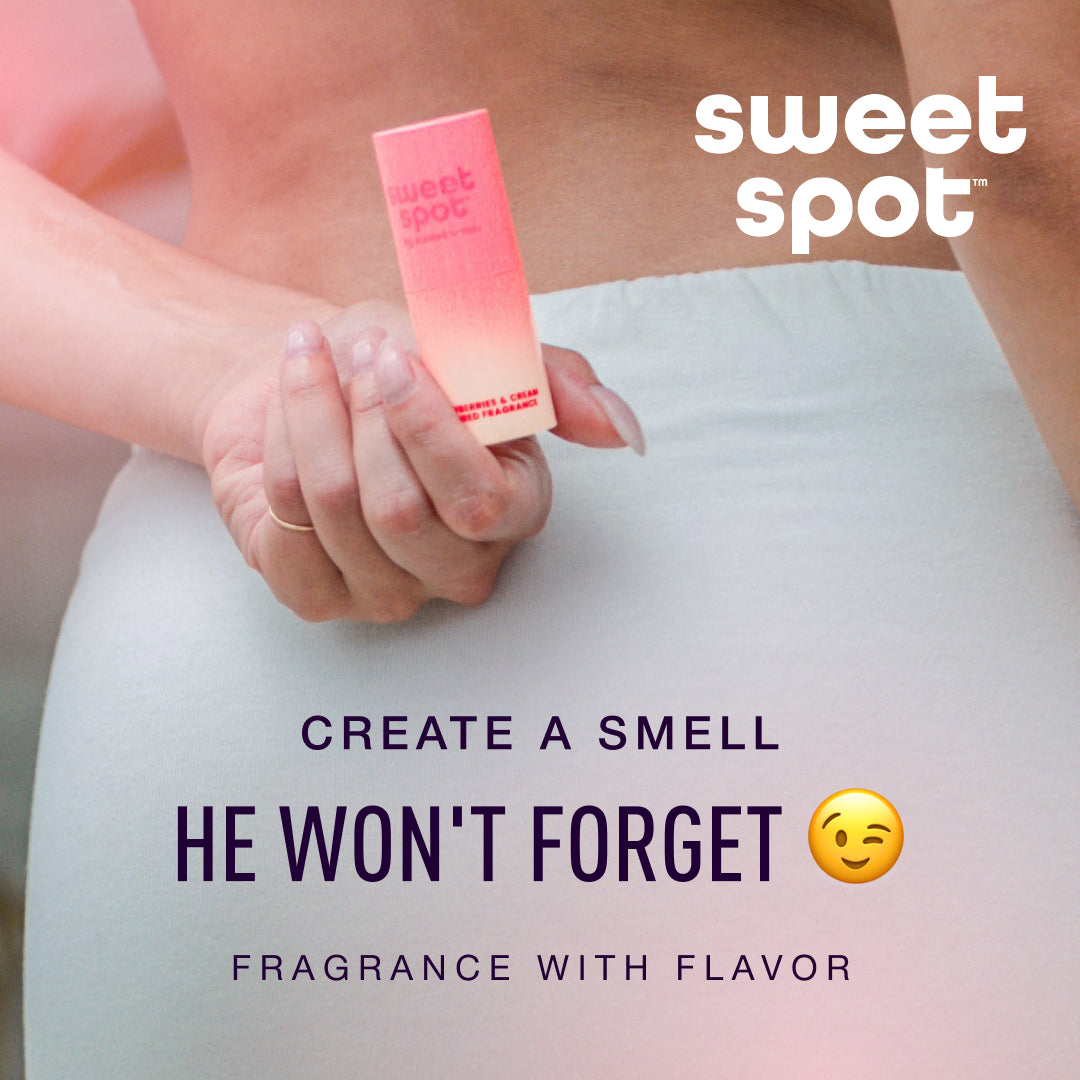 Person holding a 'sweet spot' fragrance with promotional text on a blurred background