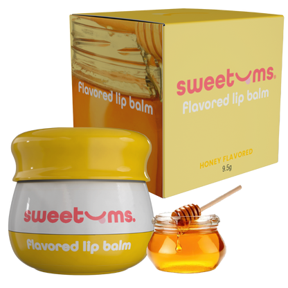 Sweetums honey-flavored lip balm with packaging and a small jar of honey on a white background