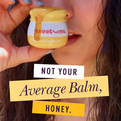 Person holding a sweetums honey flavored lip balm
