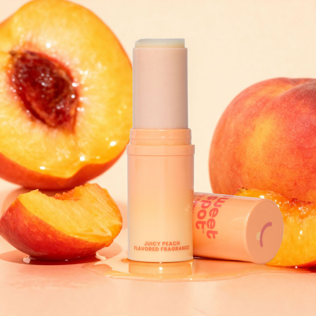 juicy peach sweet spot fragrance surrounded by peaches