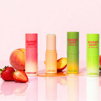 sweet spot flavored fragrances with fruits on a pink background