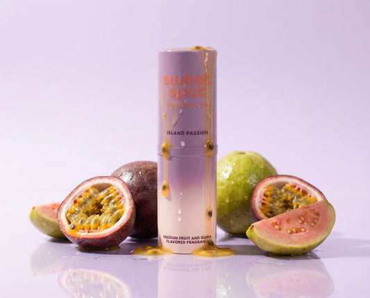 Sweet Spot passion fruit and guava fragrance on a light purple background