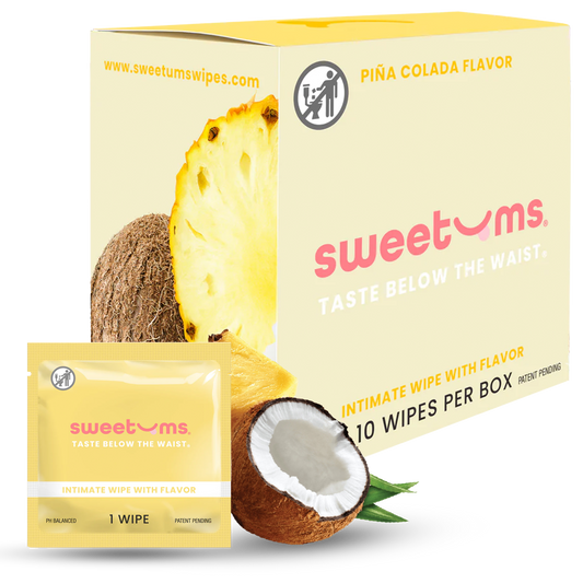sweetums intimate wipes packaging with pineapple and coconut elements on a white background