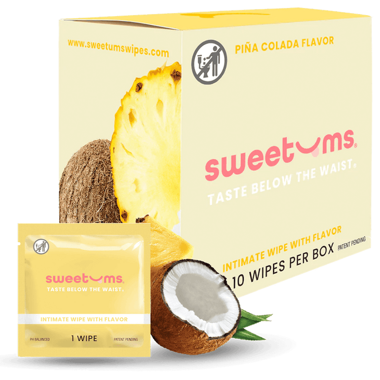 sweetums intimate wipes packaging with pineapple and coconut elements on a white background