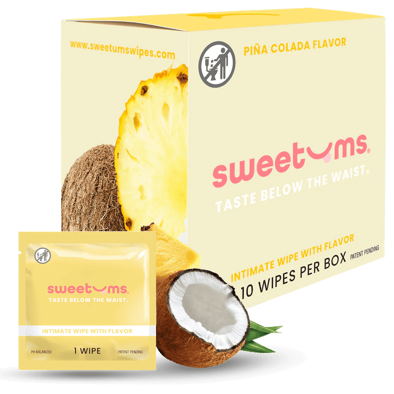 sweetums intimate wipes packaging with pineapple and coconut elements on a white background