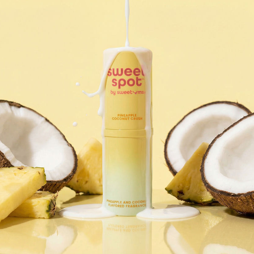 Sweet Spot pineapple and coconut fragrance product with coconuts and pineapples on a yellow background