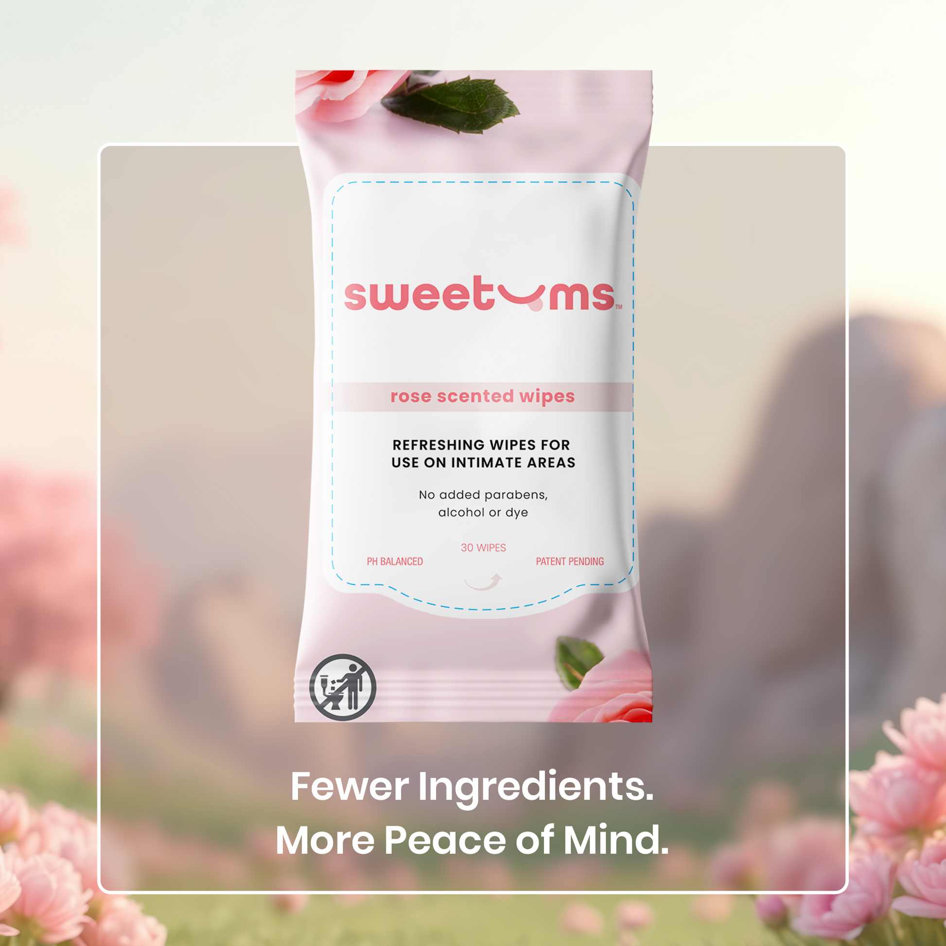 Package of sweetums rose scented wipes with a blurred floral background