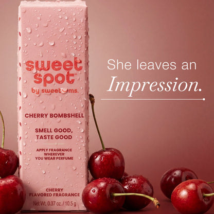 Cherry Bombshell fragrance stick with cherry graphics and text on a red background