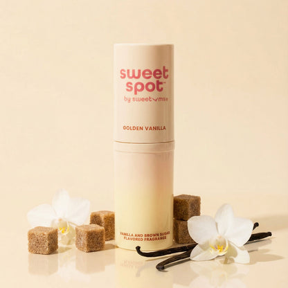 Sweet Spot Golden Vanilla product with vanilla beans and flowers on a beige background
