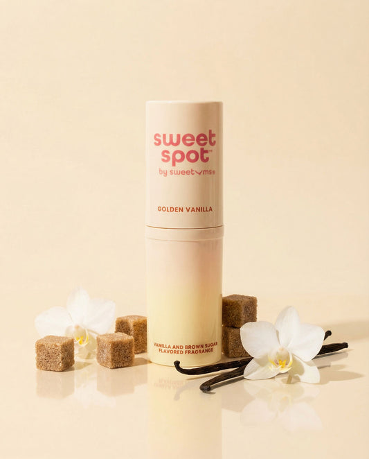 Sweet Spot Golden Vanilla product with vanilla beans and flowers on a beige background