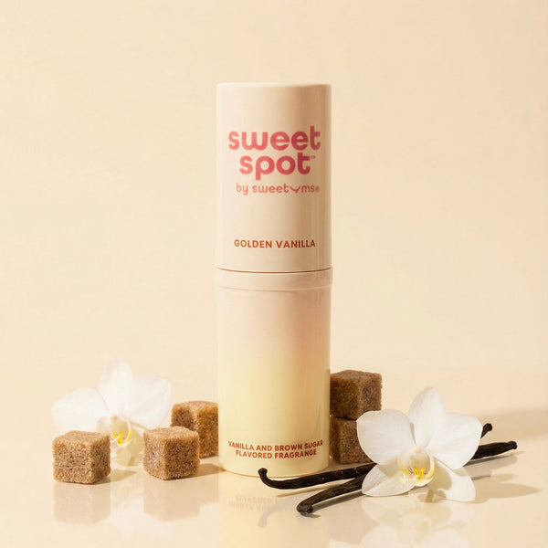 Sweet Spot Golden Vanilla product with vanilla beans and flowers on a beige background