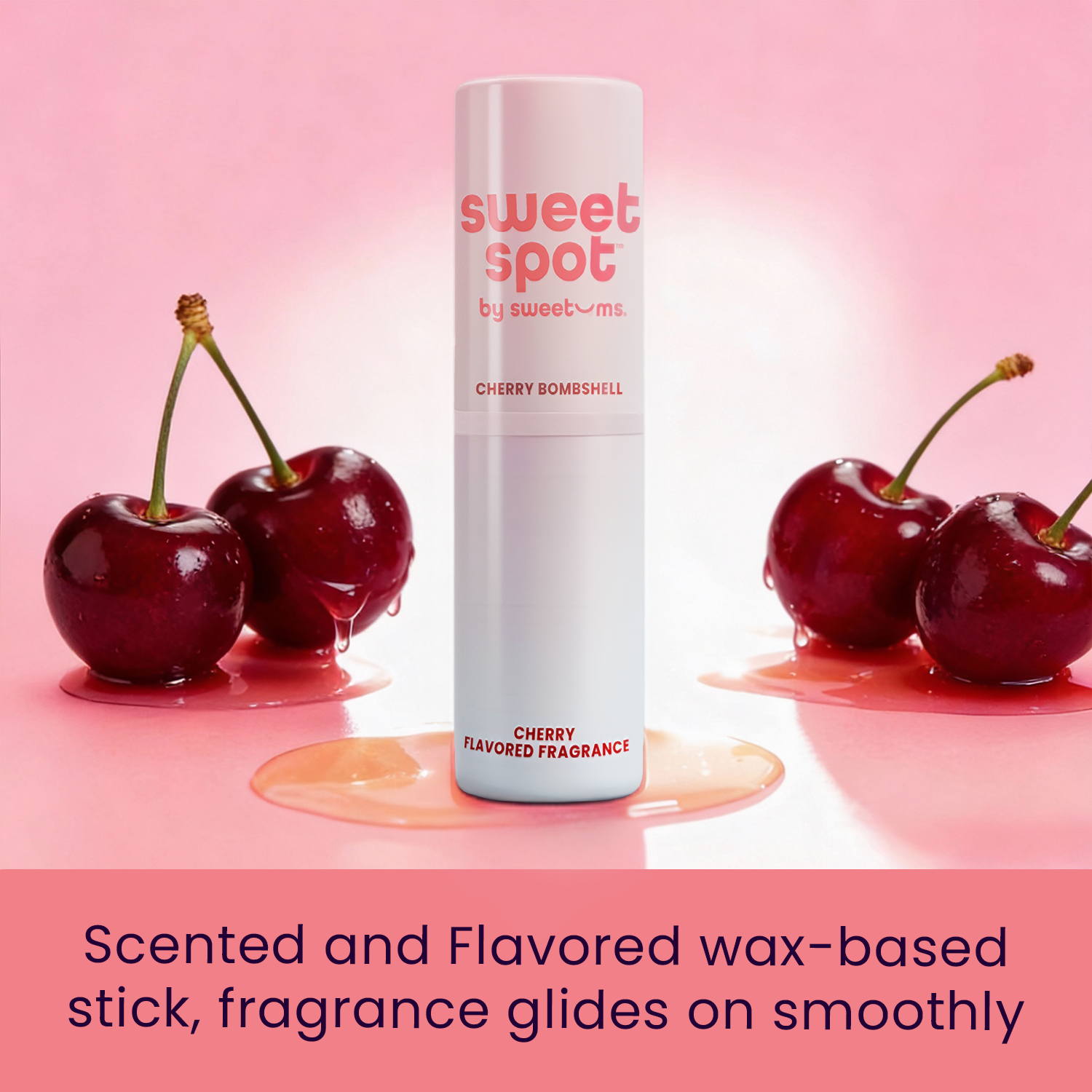 Scented and flavored wax-based fragrance stick with cherry flavor on a pink background