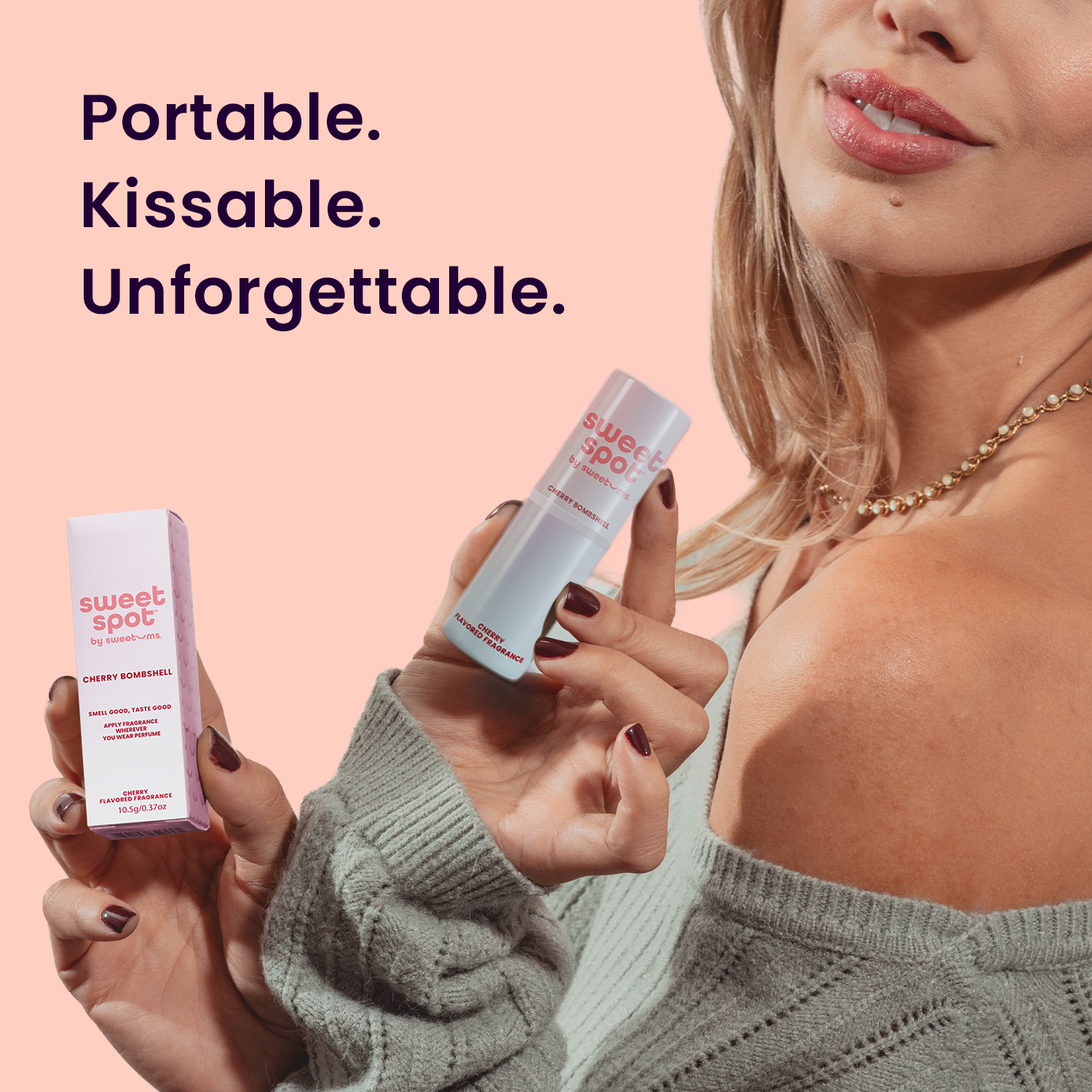 Woman holding two 'sweet spot' products with text 'Portable. Kissable. Unforgettable.' on a pink background