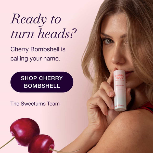 Advertisement featuring a woman holding a cherry bombshell sweet spot flavored fragrance with promotional text on a pink background.