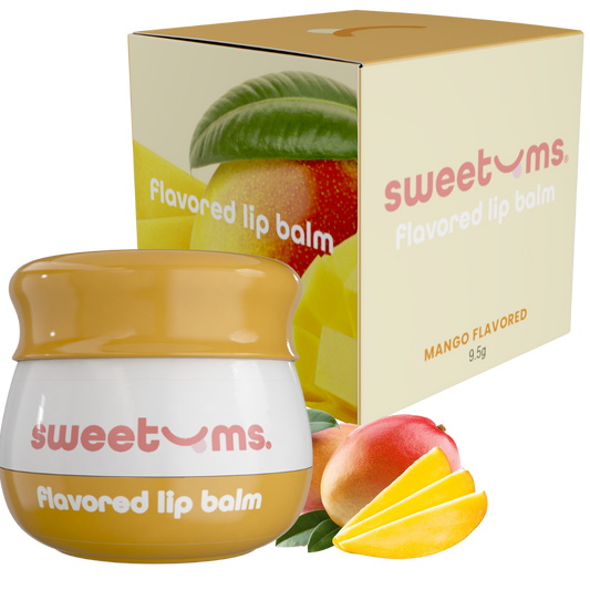 Sweetums mango flavored lip balm with packaging featuring fruit images on a white background