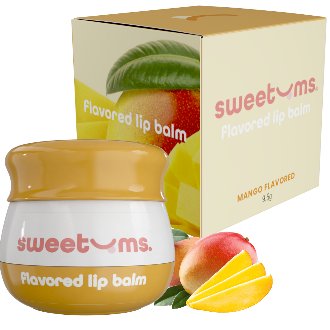 Sweetums mango flavored lip balm with packaging featuring fruit images on a white background