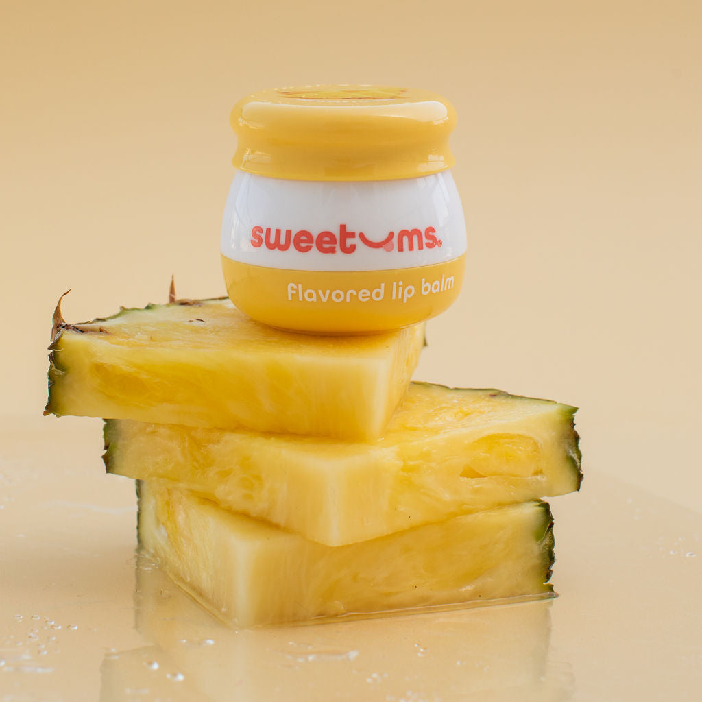 aesthetic photo of sweetums pineapple flavored lip balm