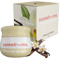 Vanilla flavored lip balm with packaging and vanilla beans on a white background